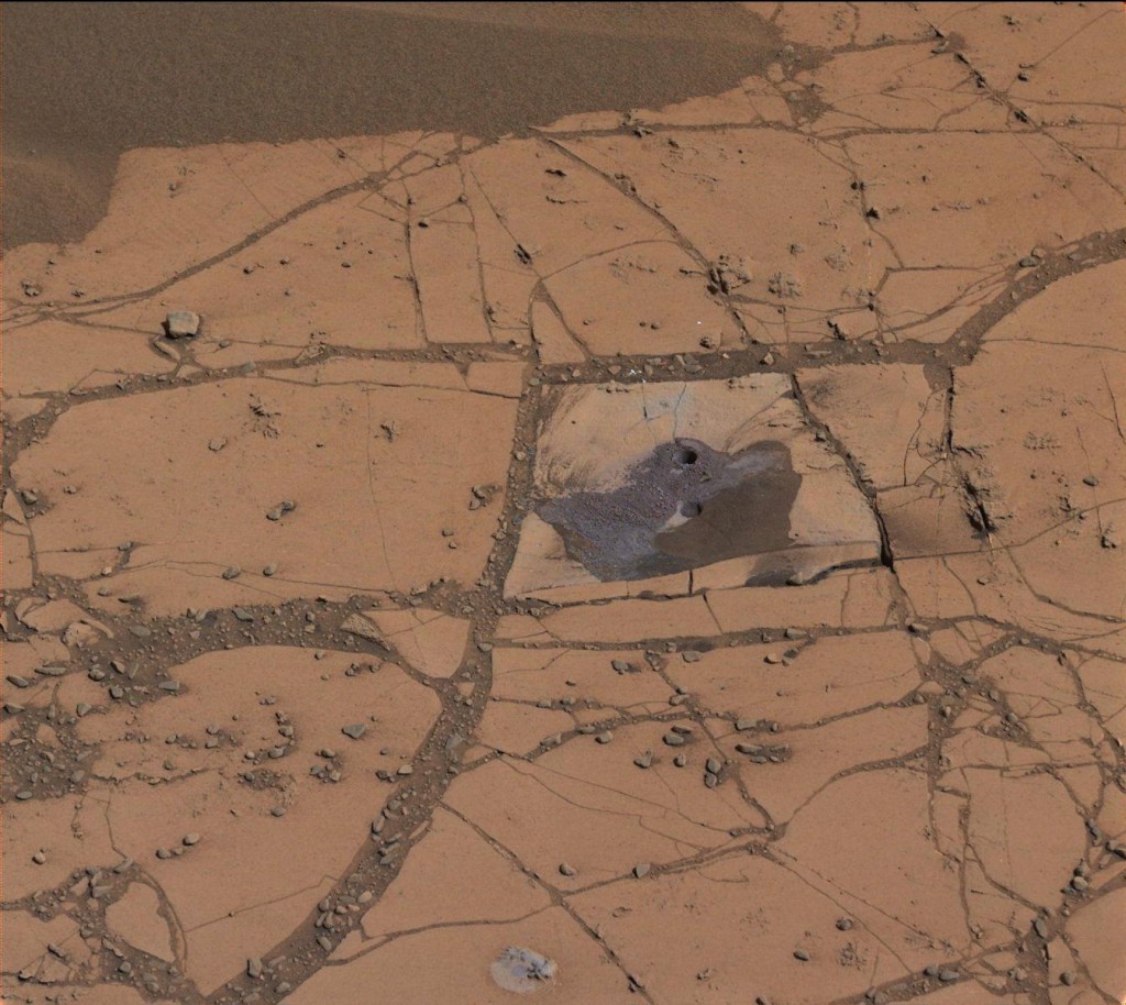 This image shows the first holes drilled by NASA's Mars rover Curiosity at Mount Sharp. Image: NASA/JPL-Caltech/MSSS.