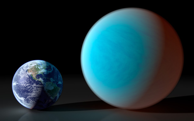 An artist's impression of exoplanet 55 Cancri e compared to the size of the Earth. Its parent star, 55 Cancri, is about 41 light-years away and just visible to the naked eye. Image credit: York University, Toronto, Canada