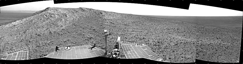 NASA's Mars Exploration Rover Opportunity recorded this view of the summit of "Cape Tribulation," on the western rim of Endeavour Crater, on the day before the rover drove to the top. This view combines four images taken by Opportunity's navigation camera on 5th January 2015—the 3,893rd Martian day, or sol, of the rover's work on Mars. The summit is about 40 feet (about 12 meters) southwest of the location from which the images were taken.  Image credit: NASA/JPL-Caltech