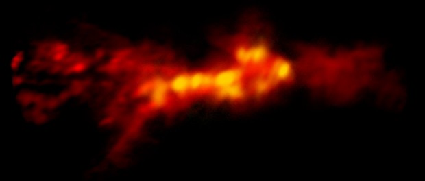 ALMA image of starbursting clouds inside NGC 253. The red region is the lower density CO gas surrounding higher density star-forming regions in yellow. Image credit: B. Saxton (NRAO/AUI/NSF); ALMA (NRAO/ESO/NAOJ); A. Leroy;