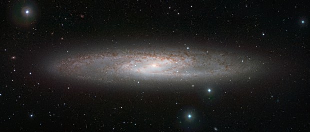 Discovered by Caroline Herschel in 1783, NGC 253 is one of the brightest galaxies in the sky. Better known as the Sculptor Galaxy or Silver Dollar Galaxy, it can be seen with binoculars near the star Beta Ceti and it is glorious in larger instruments. Image credit: ESO/J. Emerson/VISTA. Acknowledgment: Cambridge Astronomical Survey Unit