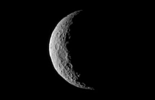 The slim crescent of Ceres smiles back as the dwarf planet awaits the arrival of an emissary from Earth. This image was taken by NASA's Dawn spacecraft on March 1st, 2015, just a few days before the mission achieved orbit around the previously unexplored world. Image credit: NASA/JPL-Caltech/UCLA/MPS/DLR/IDA