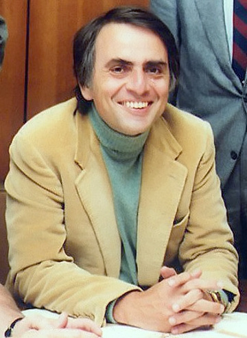 Carl Sagan (1934-1996) pictured at the signing of the papers formally incorporating the The Planetary Society's organisation, circa 1970s. An American astronomer, cosmologist, astrophysicist, astrobiologist, author and science populariser, Sagan is best remembered for presenting and co-writing the award-winning 1980 television series "Cosmos: A Personal Voyage." Image credit: NASA/JPL.