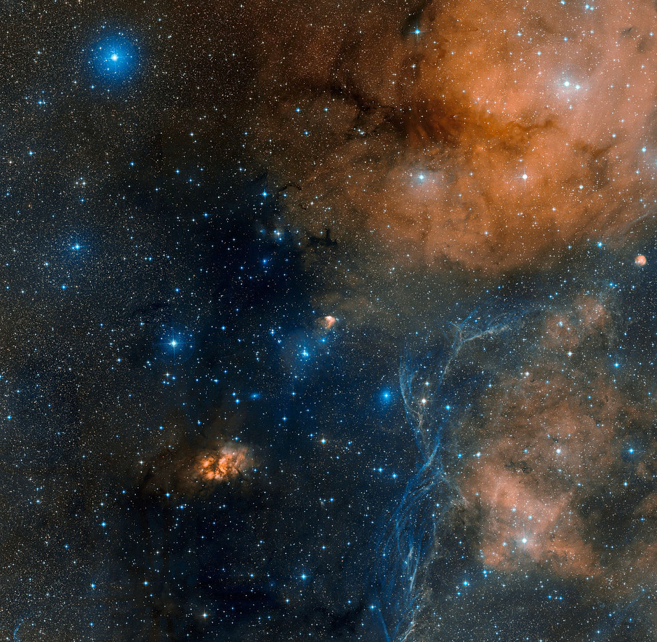 This image shows the area around the star-forming region Gum 19 (also known as RCW 34), in the direction of the constellation of Vela (The Sails), as seen by the Digitized Sky Survey 2. The image covers an area of 3° x 3° on the sky. Image credit: ESO/Digitized Sky Survey 2.