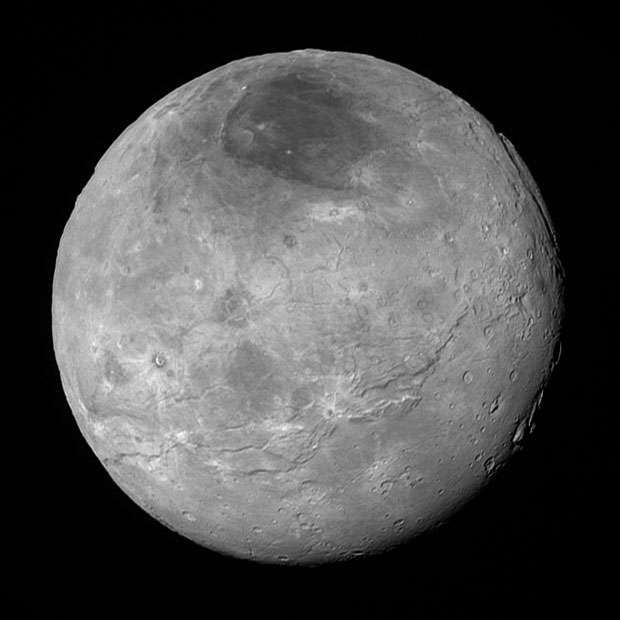 A vast rift was found to cut across the surface of Pluto’s largest moon, Charon. “It looks like the entire crust of Charon has been split open,” said John Spencer of the South-west Research Institute in Boulder, Colorado. Image: NASA/JHUAPL/SwRI.