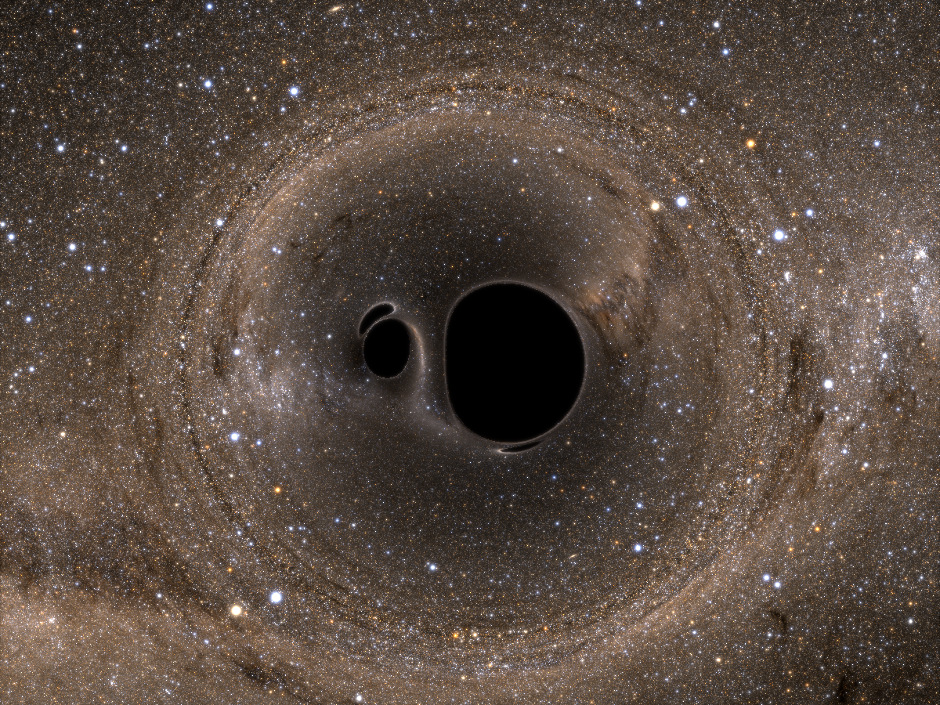 On 14 September 2015, Laser Interferometer Gravitational-wave Observatory (LIGO) detected gravitational waves from two merging black holes. The Fermi Space Telescope detected a burst of gamma rays 0.4 seconds later. New research suggests that the burst occurred because the two black holes lived and died inside a single, massive star. This is a simulation of two merging black holes in front of the Milky Way. Image credit: Andy Bohn, François Hébert, William Throwe, Darius Bunandar, Katherine Henriksson, Mark A. Scheel, and Nicholas W. Taylor.