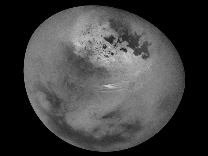 New video shows bright clouds of methane drifting across Saturn's largest moon, Titan. Click the graphic to open a full-size 28.9MG GIF animation in a new window. Image credit: NASA/JPL-Caltech/Space Science Institute.