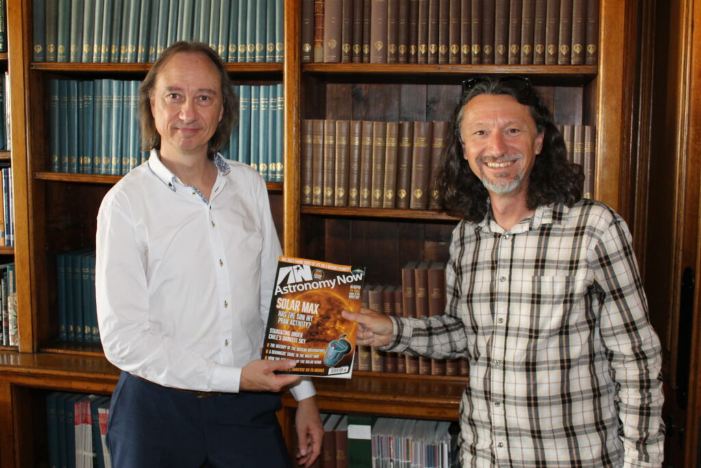 Stuart Clark and Steven Young holding a copy of Astronomy Now magazine.